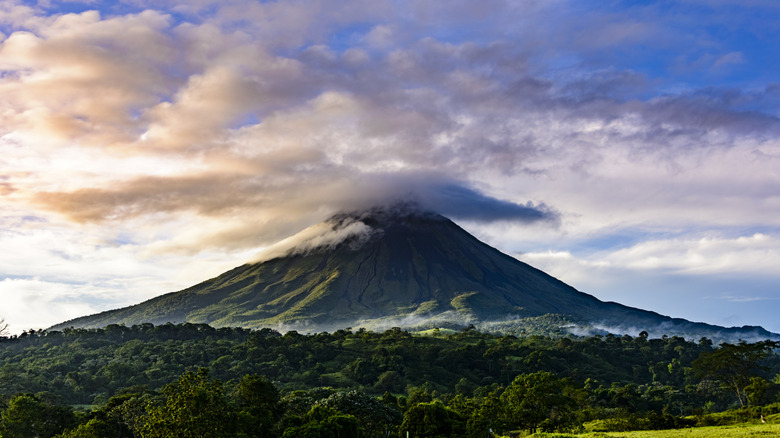 The impressive Arenal Volcano surrounded by dramatic skies in Costa Rica