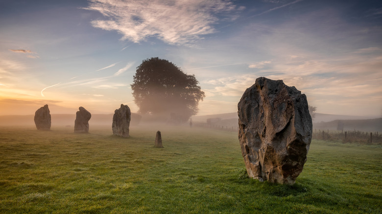 Avebury standing stones at sunrise