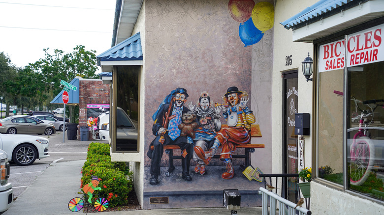 A mural of clowns on a bench in Lake Placid, FL