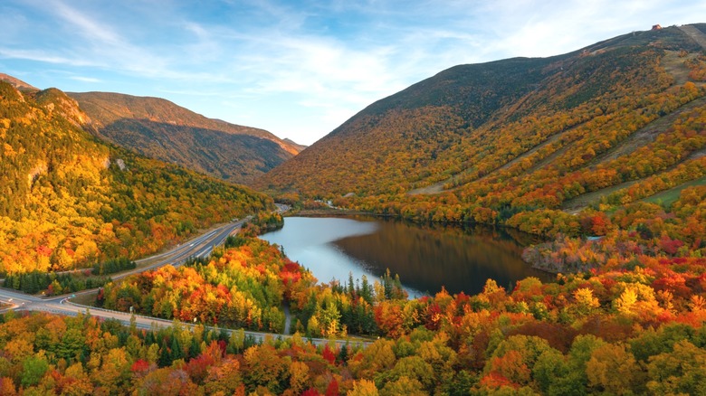 Echo Lake surrounded by fall colors and mountains in New Hampshire