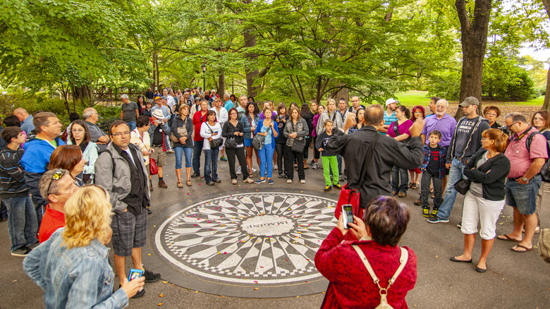 Fans at Strawberry Fields mosaic