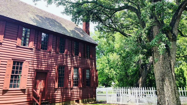 Historic Palmer-Marsh House next to a tree in Bath, North Carolina