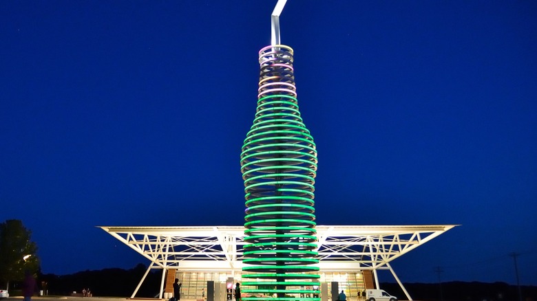 Giant soda bottle lights up at night