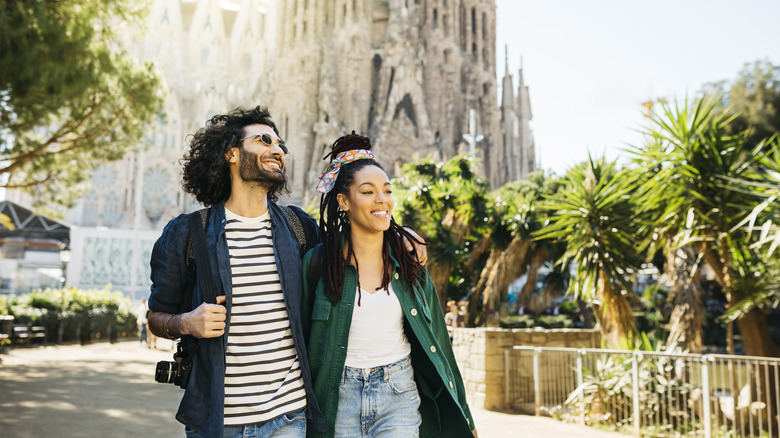 Couple walking in Barcelona