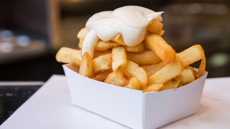 Belgian frites topped with mayonnaise sauce