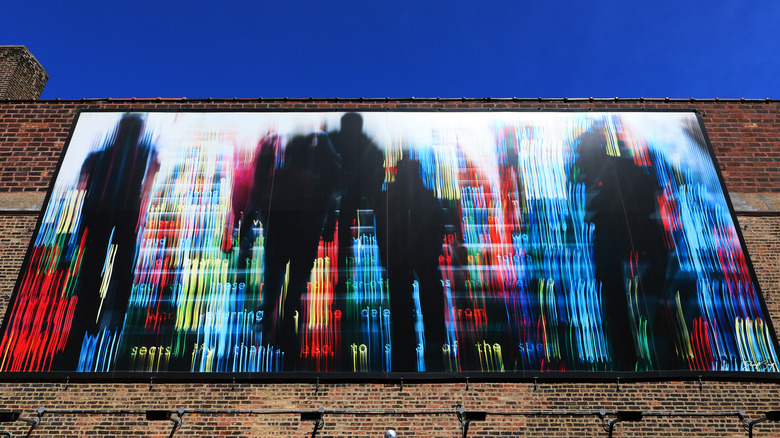 Mural depicting people's silhouettes in Chicago's Wabash Arts Corridor