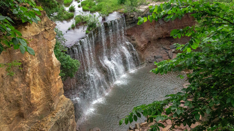 Aerial view of Cowley County Waterfall, with trees surrounding it