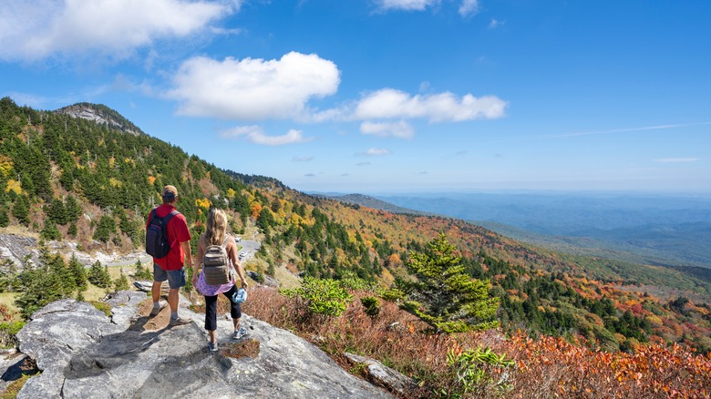 Hiking couple Banner Elk fall views