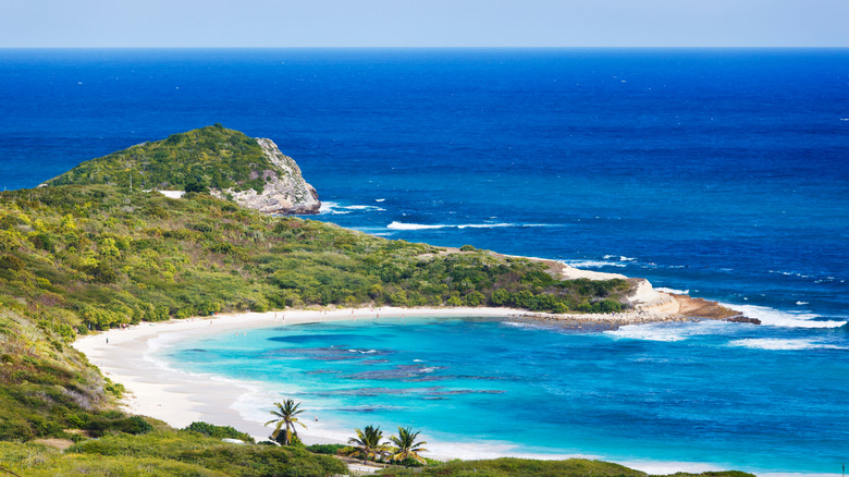 The beautiful Half Moon Bay in Antigua seen from above