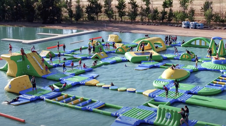 People playing at the Aqua Park at Wake Island Waterpark