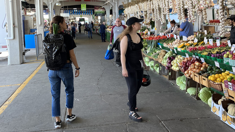 A local garlic producer setting up shop at the Jean-Talon Market in Quebec