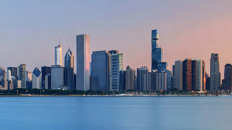 A sunrise, skyline view of Chicago across the water