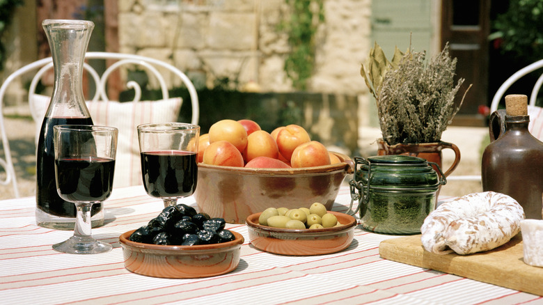 Red wine and charcuterie spread.