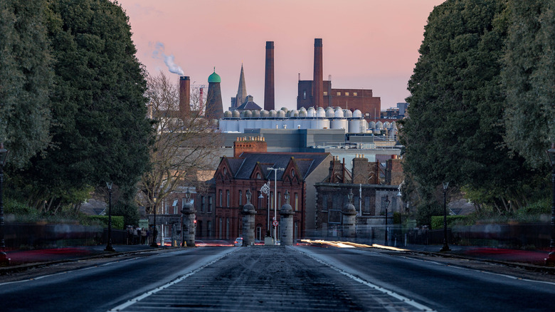 view of Guinness Brewery and buildings at sunset in Dublin