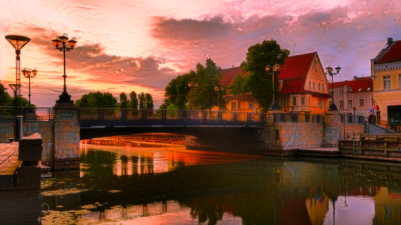 Bridge crossing the river with Klaipeda old town behind