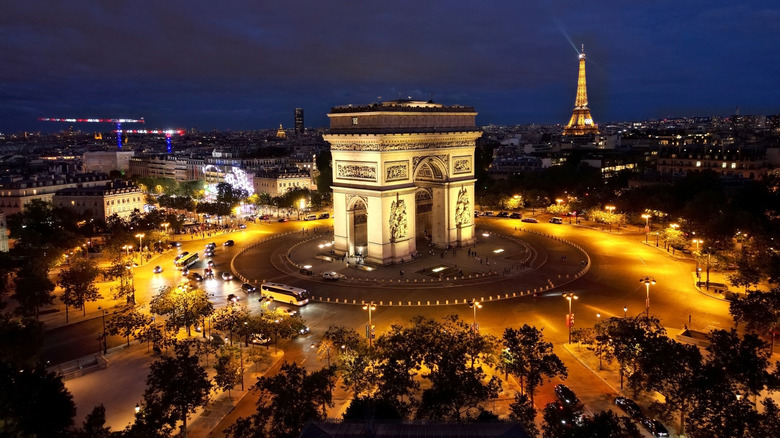 Arc de Triomphe at Champs Elysees at night, Paris, France