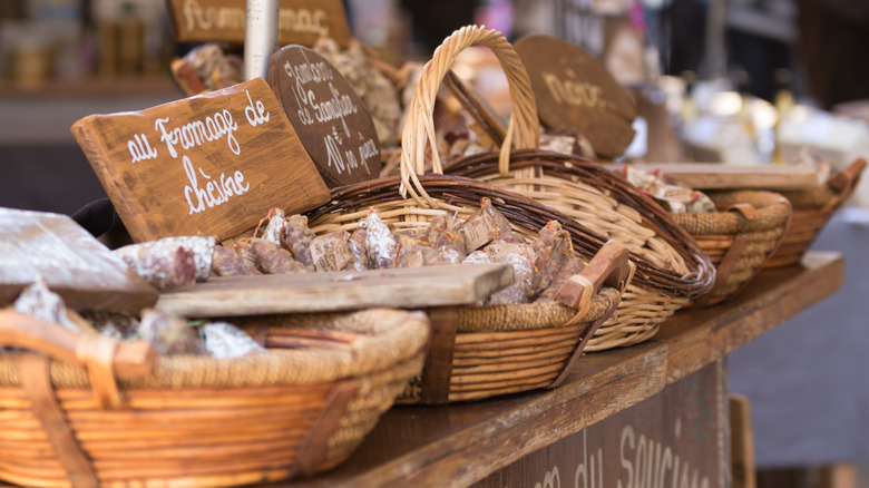 baskets of French market goods on display