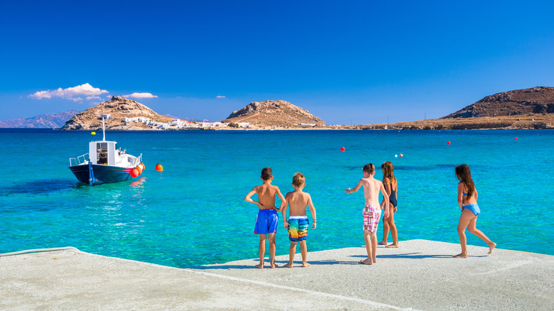 Kids on a beach platform