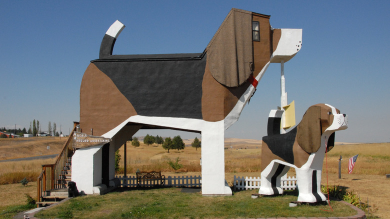 A 30-foot and smaller beagle sculpture at Dog Bark Park