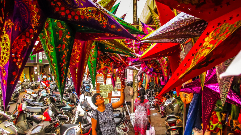 woman shopping at Christmas market in Goa