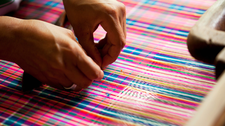 Colorful silk on a loom