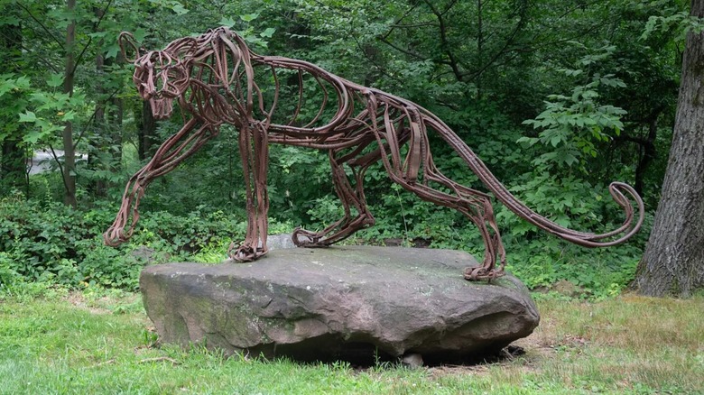 big cat sculpture at Wildflower Sculpture Park