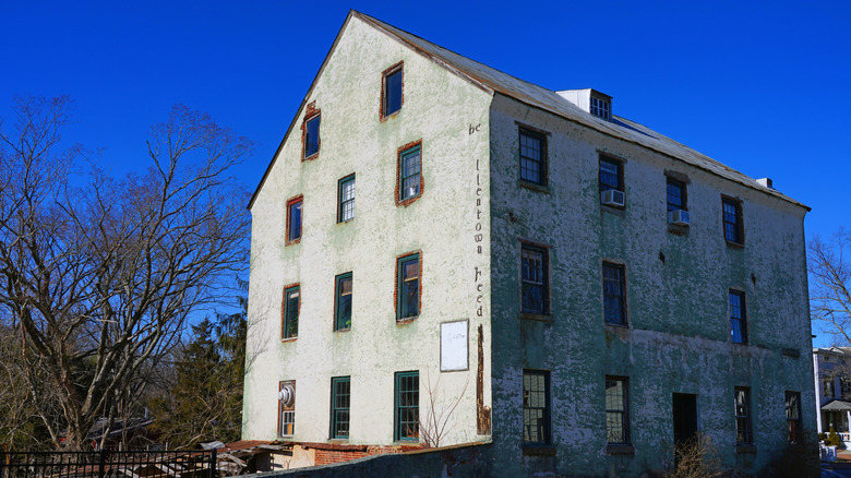 The Old Mill building in Allentown, New Jersey, against the blue sky