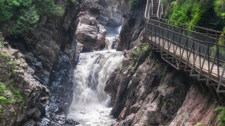 Waterfall and bridge in High Falls Conservation Area, New York