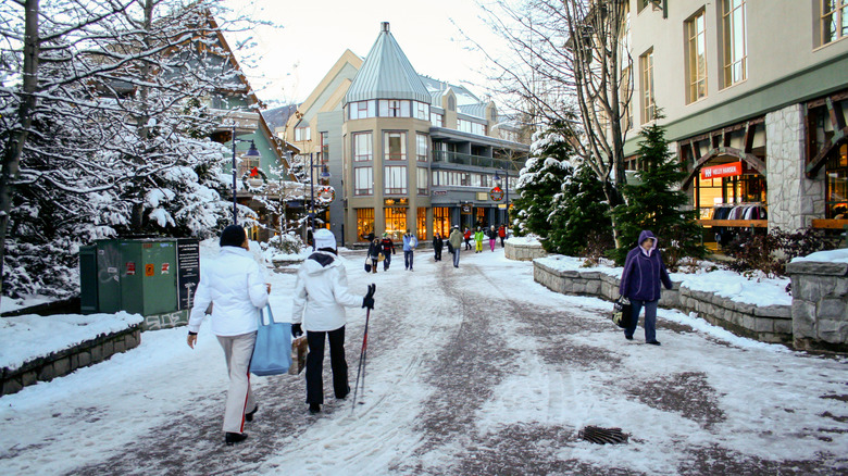 Winter ski season visitors in the streets of Whistler in BC, Canada