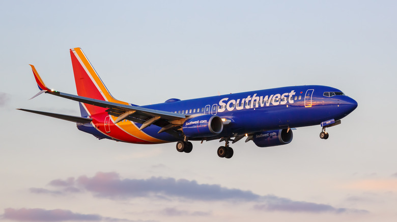 southwest airplane flying in clouds