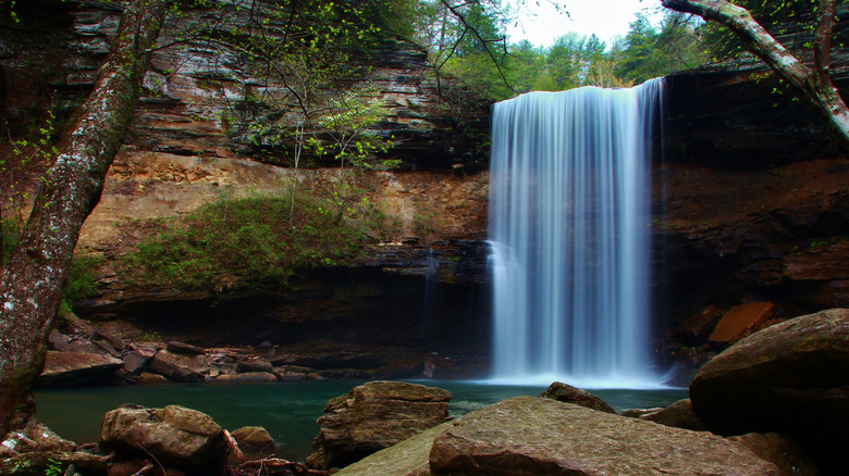 Waterfall cascading over rock outcropping