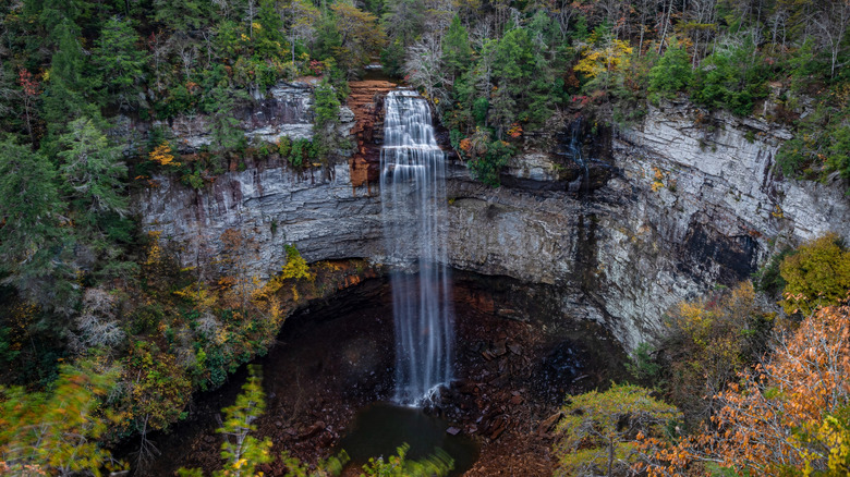 Fall Creek Falls cascading through fall foliage in Fall Creek Falls State Park, Tennessee