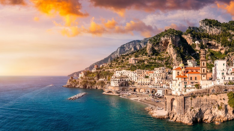 aerial view of the coastal town of Atrani and the sea at golden hour