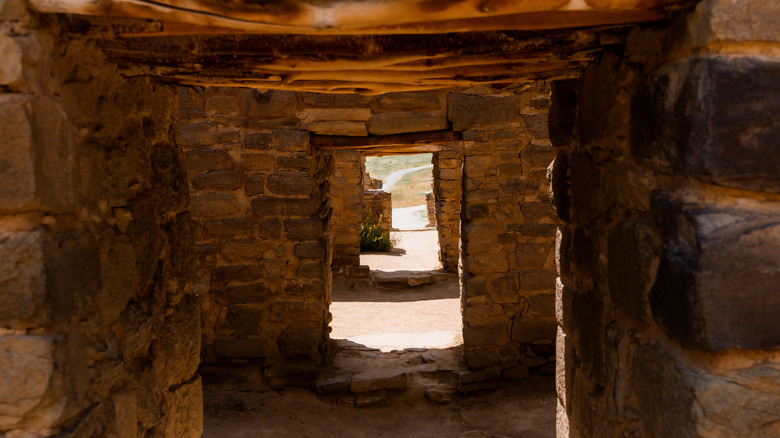 Sunlit passageways through Aztec Ruins National Monument