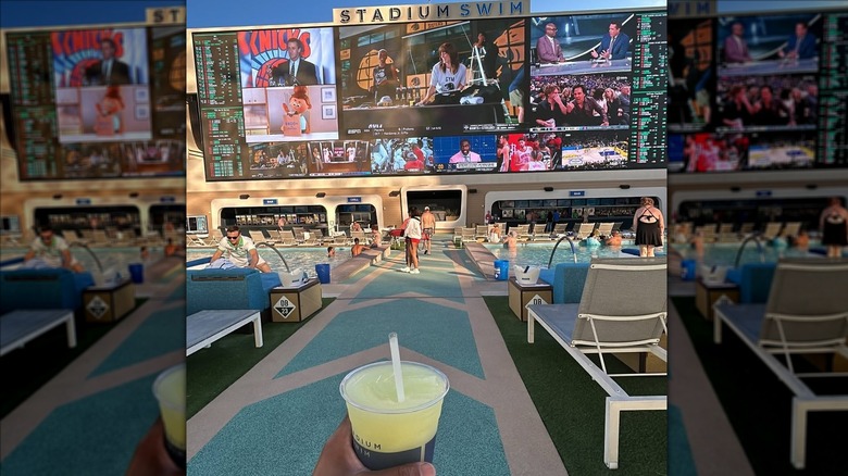 hand holding drink at Stadium Swim at Circa Resort in Las Vegas