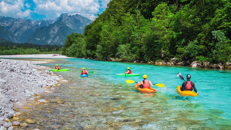 Kayakers on the Soča River in Slovenia