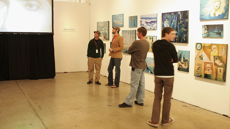 Visitors looking at art in a gallery in Bergamot Station in Santa Monica