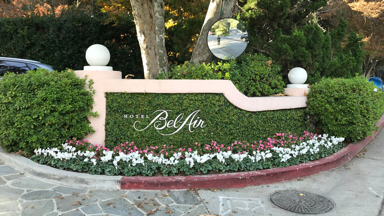 Perfectly-manicured hedge inscribed with Hotel Bel-Air