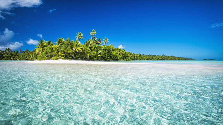 A tropical Tuvalu beach lagoon with aquamarine waters