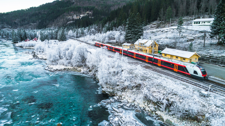 Train in snowy landscape from Bergen to Oslo, Norway