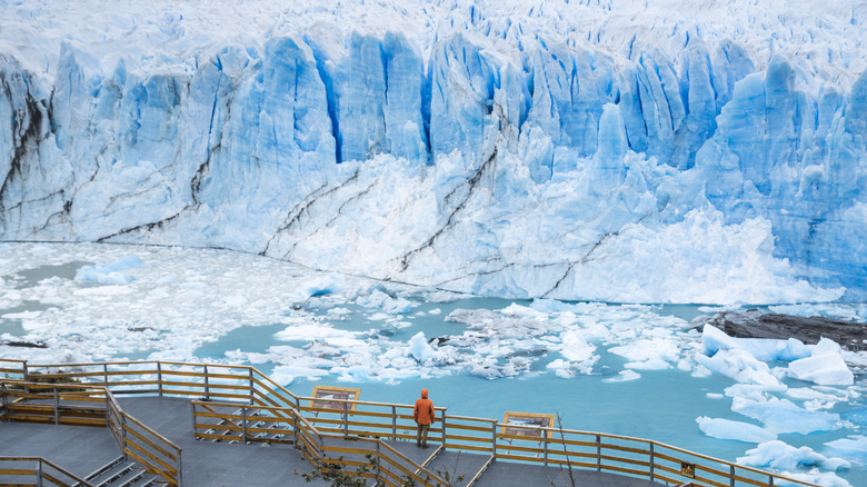 Glacial ice peaks in front of an outlook