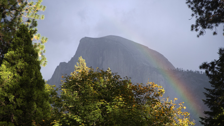 A scenery and rainbow in Yosemite National Park, including Half Dome National Park