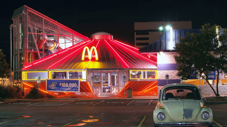 Night view of UFO McDonald's, located in Roswell, New Mexico, lit up in neon