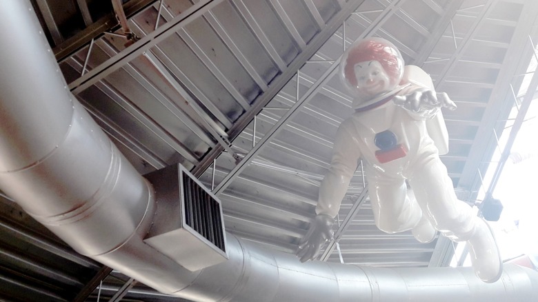 View of Ronald McDonald in a white space suit at UFO McDonald's