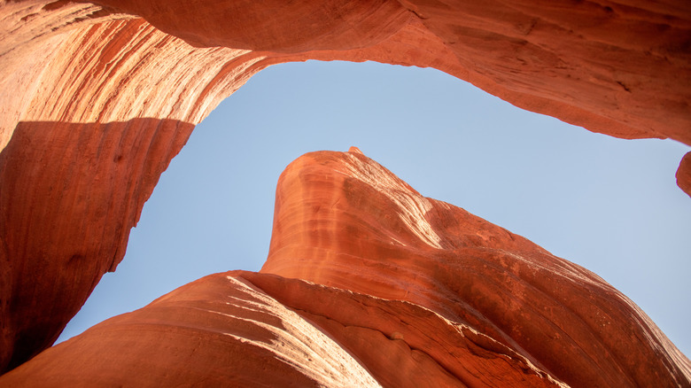 Peek-A-boo Slot Canyon with sunlight streaming down in Kanab Utah