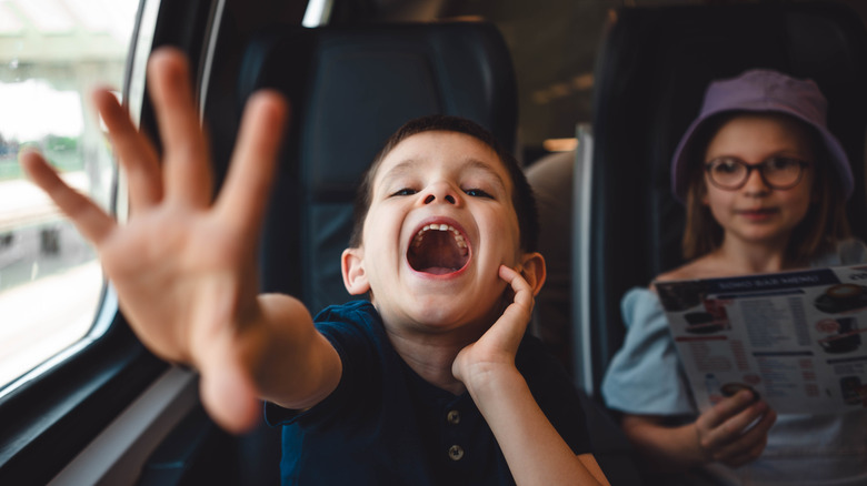 Loud child on a train