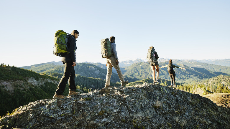 A group of travelers hiking on a mountain