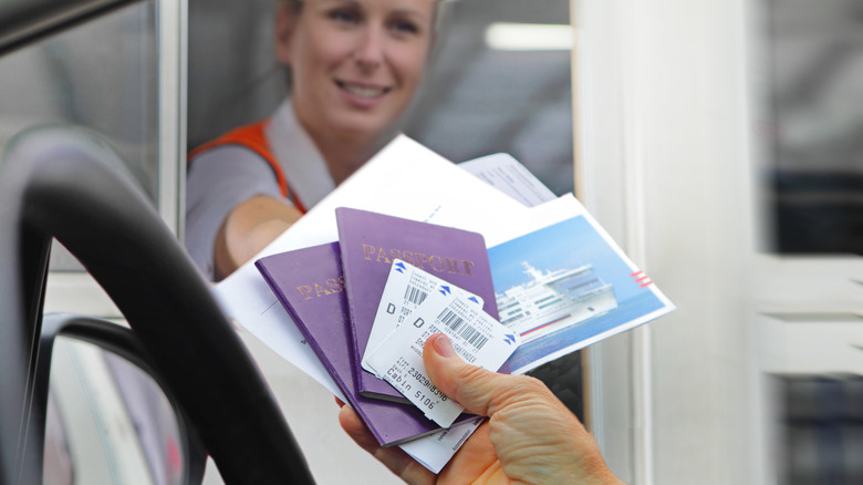 Giving travel documents to an officer at a land border crossing