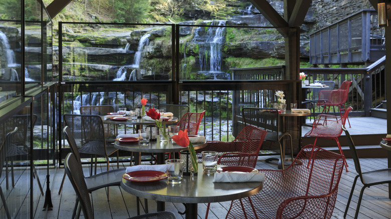 Glass restaurant with waterfall views