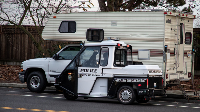 police checking illegally parked RV